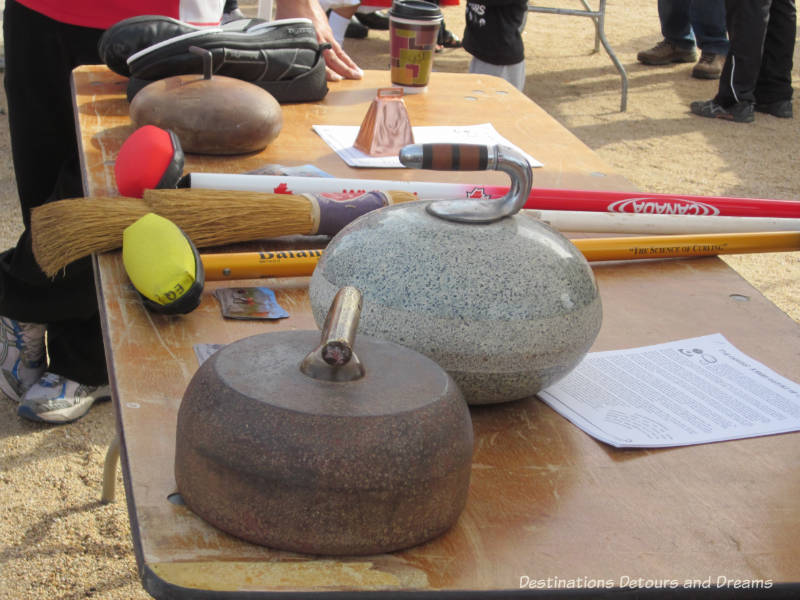 Curling rock and curling information sheets at The Great Canadian Picnic