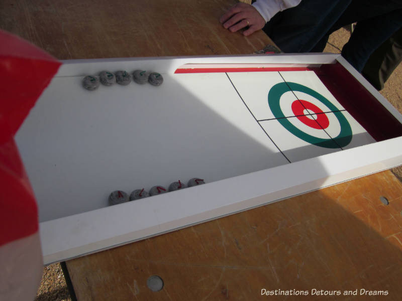 Tabletop curling game at The Great Canadian Picnic