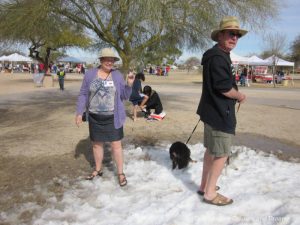 Standing on a small patch of snow wearing shorts at the Great Canadian Picnic