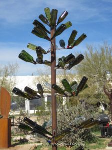 Sculpture made of wine bottles at In the Sculpture Courtyard at Arizona Fine Art Expo in Scottsdale Arizona