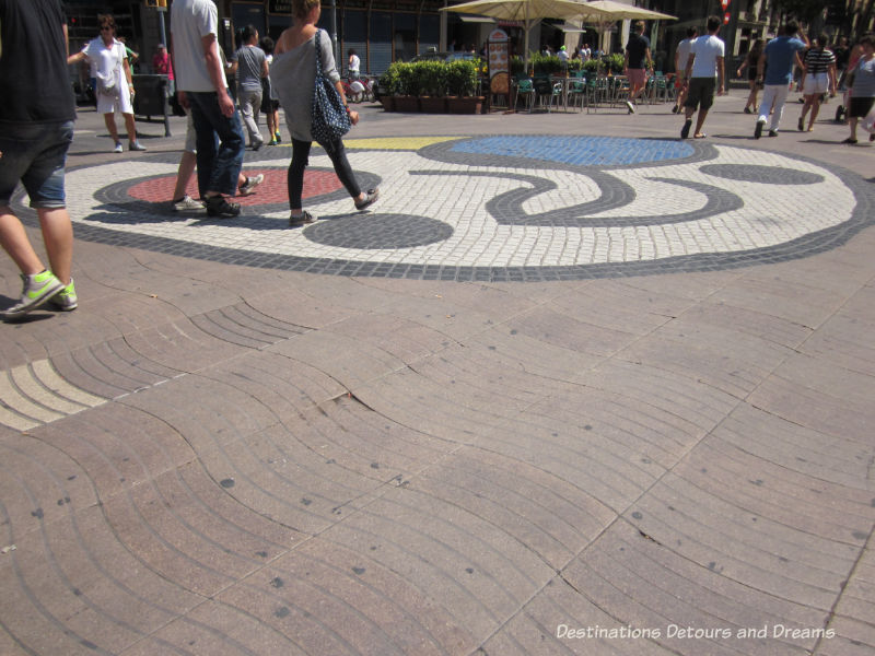 Joan Miró mosaic on Las Ramblas. Guide to exploring Barcelona on foot: Las Ramblas, the Gothic Quarter, the Eixemple district, and the beach