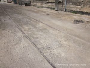 Remnants of old railway ties in Hell's Alley in Winnipeg's historic Exchange District - a walking tour of the East exchange area.