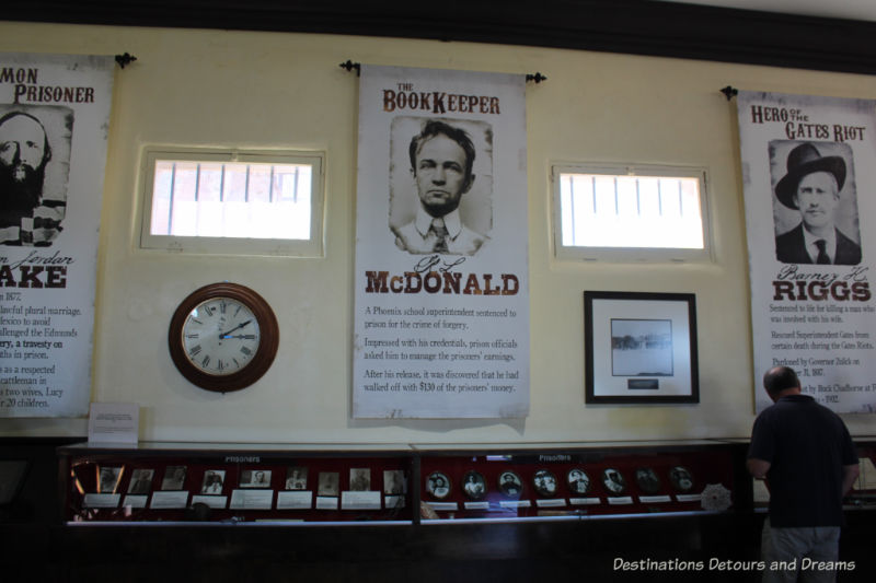 Posters with information about former prisoners at Yuma Prison Museum