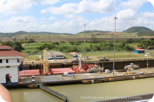 Ship being pulled through Miraflores Locks