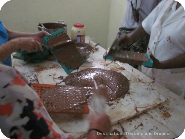 pouring chocolate into molds