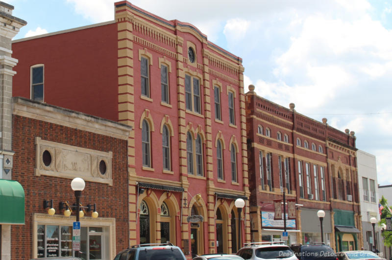 Italianate style historic building along a small town main street in New Ulm, Minnesota