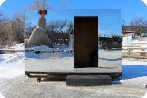 Mirror Cloaking warming hut along Winnipeg's river ice skating trail