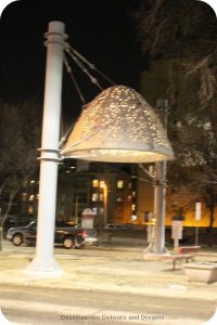 Winnipeg Public Art: Heaven Between by Bill Pechet lit at night