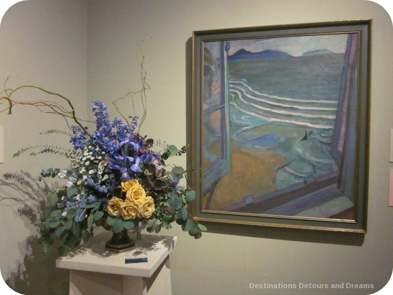 Art in Bloom: a floral display inspired by art at the Winnipeg Art Gallery: design by Sharlene Nielsen inspired by Frederick Horsman Varley's "View for the Artist's bedroom, Jericho Beach"