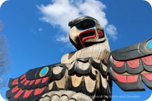 Totem pole in the sky - The Feast by Doug LaFortune (a.k.a. William Horne) in Duncan British Columbia