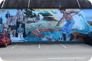 Murals in Chemainus, British Columbia (Muraltown): part of The Thirty-Three Metre Collage, section by Frank Lewis and Nancy Lagana