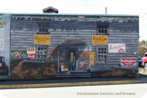 Murals in Chemainus, British Columbia (Muraltown): The Hong Hing Waterfront Store by Paul Marcano