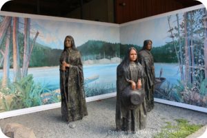 Murals in Chemainus, British Columbia (Muraltown): Three Generations Sculpture by Sandy Clark