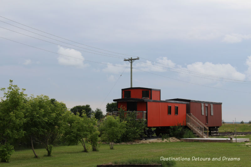 Train at Arborg and District Multicultural Heritage Village,where restored buildings preserve the past. 