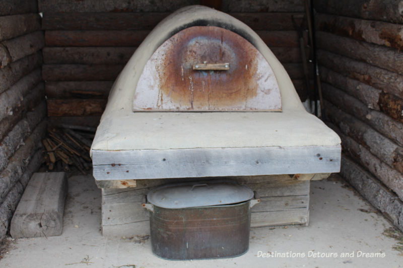 Ukrainian bake oven at Arborg and District Multicultural Heritage Village,where restored buildings preserve Manitoba's past. 