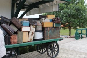 Vintage luggage at Inkster Station waiting for The Great Train Robbery: a fun excursion on Manitoba's Prairie Dog Central Railway, a heritage train