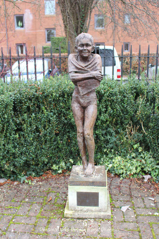 Statue in Victoria Garden. History and British Charm in Farnham. Farnham is a historic British market town located on the western edges of Surrey in the rolling Surrey Hills. It is known for its Georgian streets, historic buildings, craft heritage, and easy access to the North Downs Way.