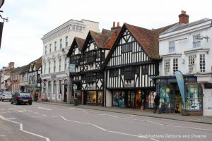 History and British Charm in Farnham. Farnham is a historic British market town located on the western edges of Surrey in the rolling Surrey Hills. It is known for its Georgian streets, historic buildings, craft heritage, and easy access to the North Downs Way.