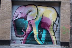 London street art in Brick Lane: coloured elephant by Falko One of Cape Town