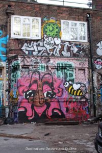 London street art in Brick Lane: Seven Stars