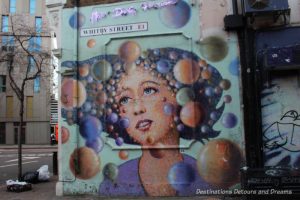 London street art in Shoreditch: painting by Jimmy C on Whitby Street