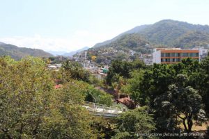 The Colourful Architecture and History of Gringo Gulch, Puerto Vallarta, Mexico: view of hills across Rio Cuale