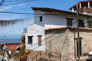 The Colourful Architecture and History of Gringo Gulch, Puerto Vallarta, Mexico: old and new construction side by side