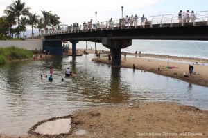 Children playing in the Cuale River where it joins Banderas Bay in Puerto Vallarta