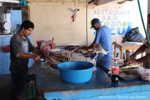 Strolling the Puerto Vallarta Malecón: fish cleaning at one end