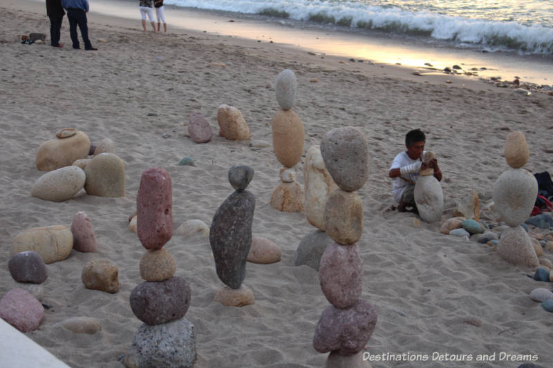 Strolling the Puerto Vallarta Malecón:: building stone sculptures