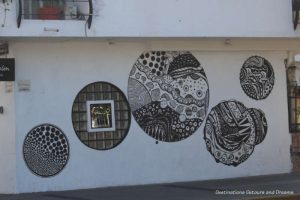 Puerto Vallarta street art:black and white circular motifs