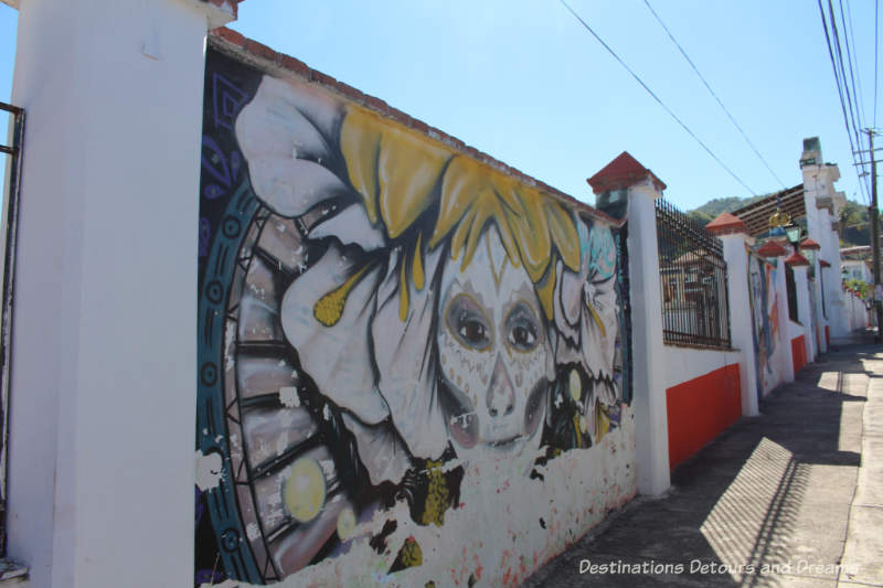 Street art painted on the wall around El Panteón Cemetery in Puerto Vallarta