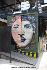 Puerto Vallarta street art: divided face of man/woman