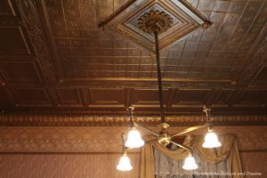 Chandelier in parlour of Rosson House; equipped with electric bulbs and gas lamps