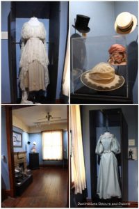 An exhibit of Victorian clothing inside the Stevens-Hausten Building