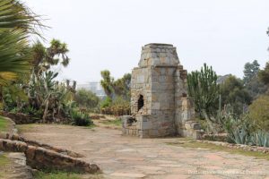 Cacti and stone fireplace in Old Cactus Garden in Balboa Park