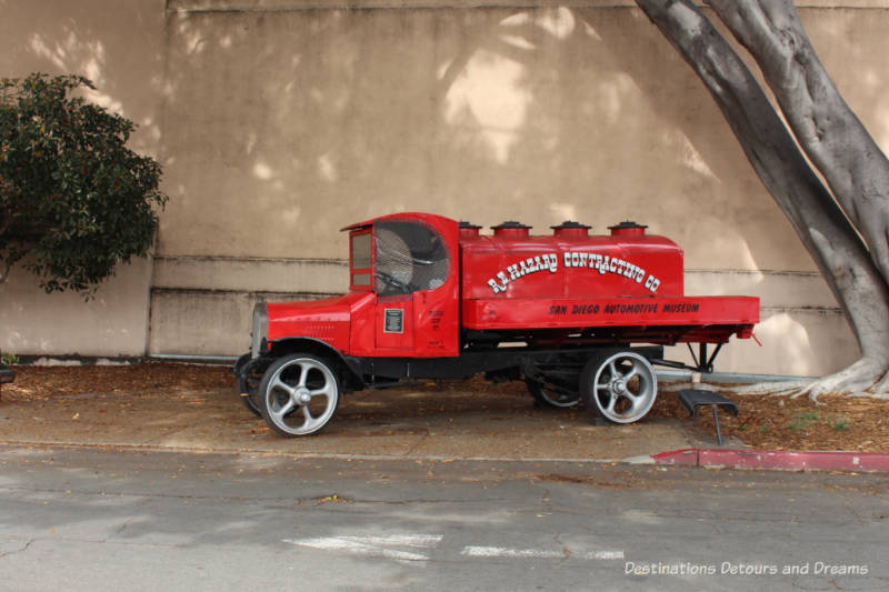 Vehicle in front of the San Diego Automobile Museum