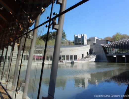 Crystal Bridges Museum of American Art building circles around a pond