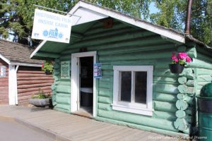 Turquoise log cabin in Pioneer Park Fairbanks, Alaska