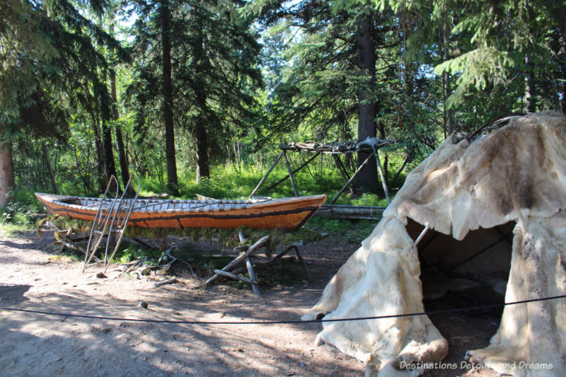 Birch canoe and temporary dwelling at display about nomadic Athabascan life at Chena Village in Fairbanks, Alaska