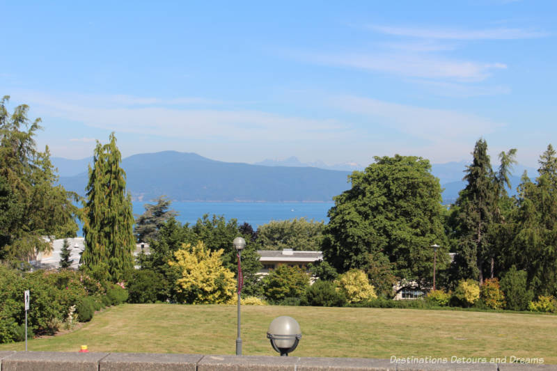 View of sea and mountains from UBC Rose Garden View of mountains and sea from UBC Rose Garden