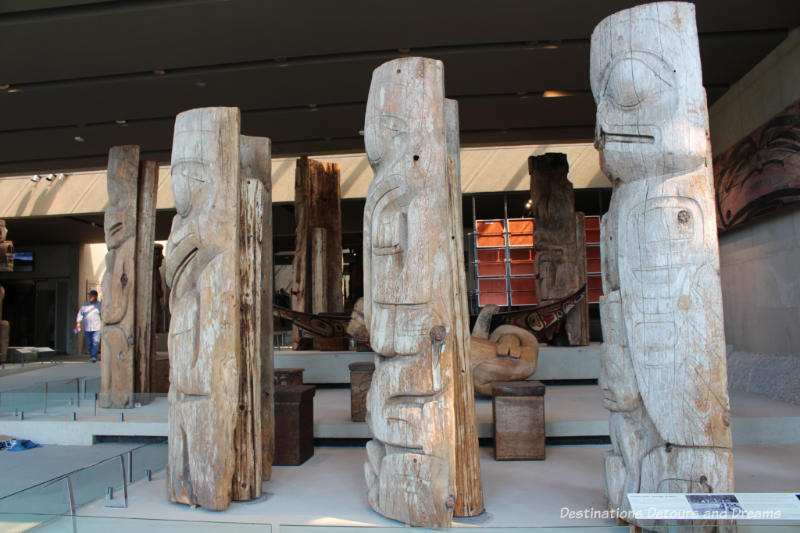 Weathered totem poles at Museum of Anthropology