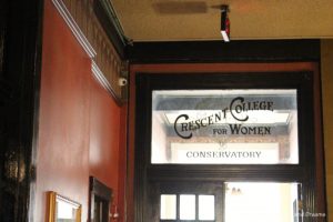 Sign for Crescent College for Women on day to conservatory at Crescent Hotel & Spa