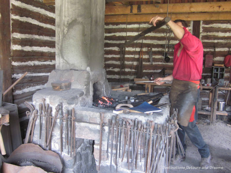 Blacksmith at work at Fort Gibraltar in Winnipeg, Manitoba