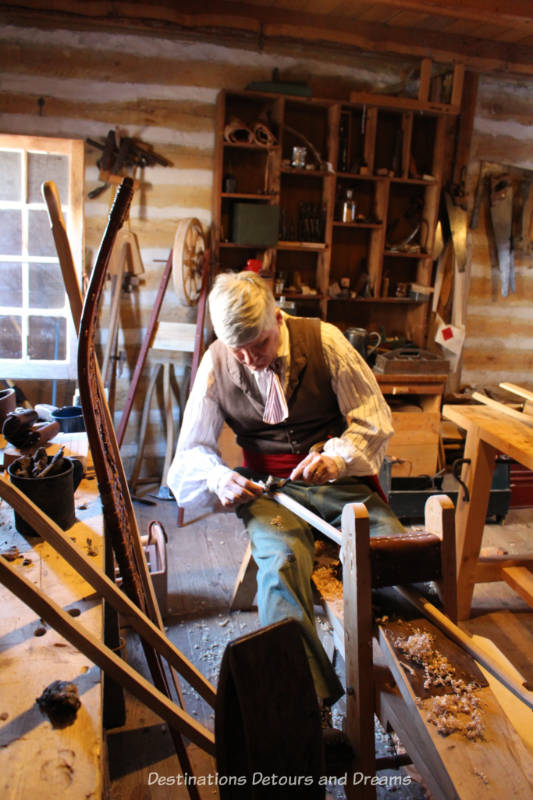 Interpreter making snowshoes at Fort Gibraltar in Winnipeg, Manitoba