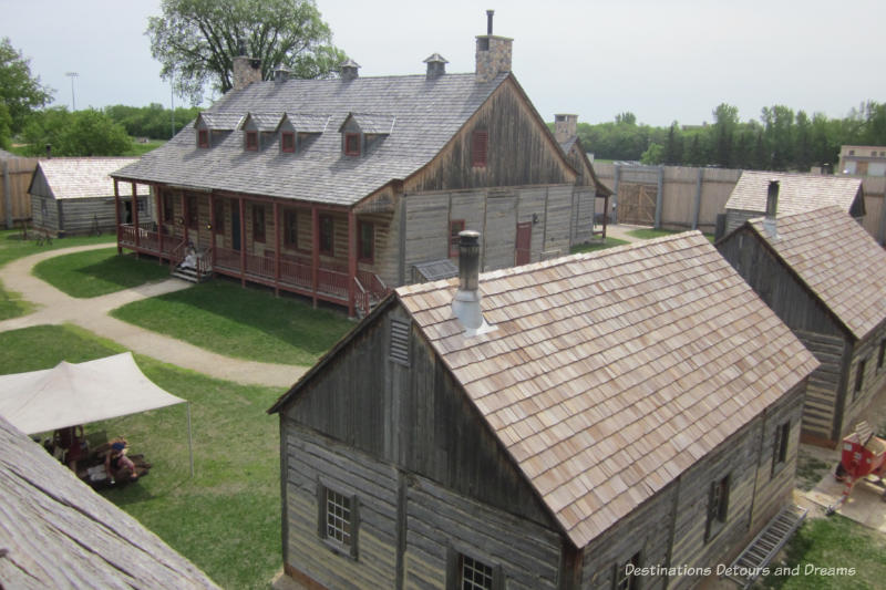 The Great Hall and other wooden structures of Fort Gibraltar in Winnipeg, Manitoba as viewed from the second level of the wall around the fort