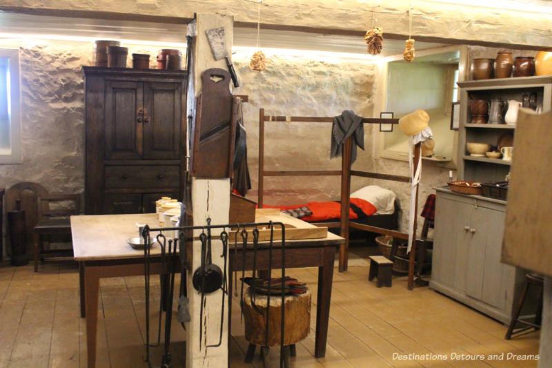 Kitchen area in the Big House at Lower Fort Garry complete with sleeping cot for staff