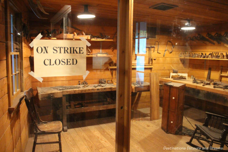Workshop with On Strike Closed sign in window at Manitoba Museum