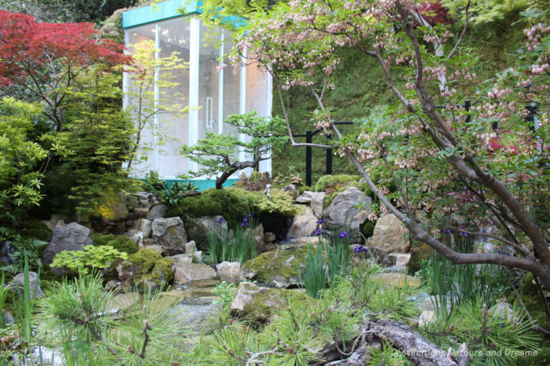 Glass shower house in a tranquil Japanese-style garden, the Green Switch Garden at the 2019 Chelsea Flower Show