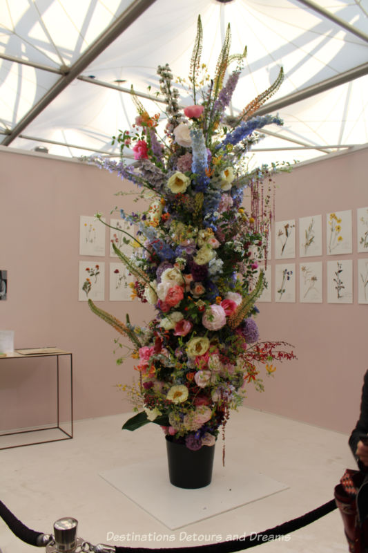 Cut flowers on an upright birch pole create a 3m-tall living herbarium at the 2019 Chelsea Flower Show